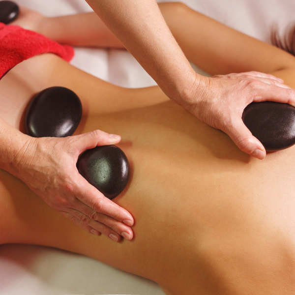 Hot Stone Massage on Femal Customer